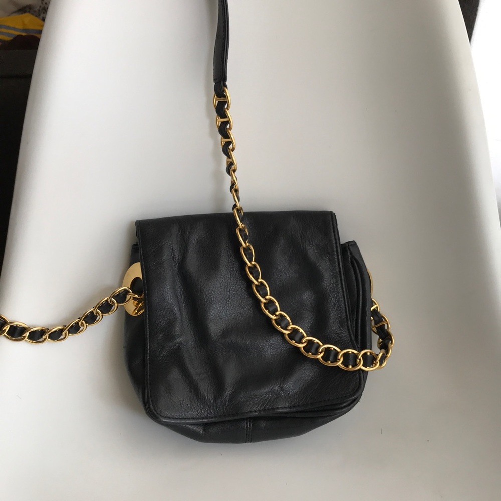 Black leather crossbody bag with gold hardware